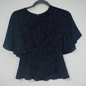 SOLD. Express black with white polka dots sz XS